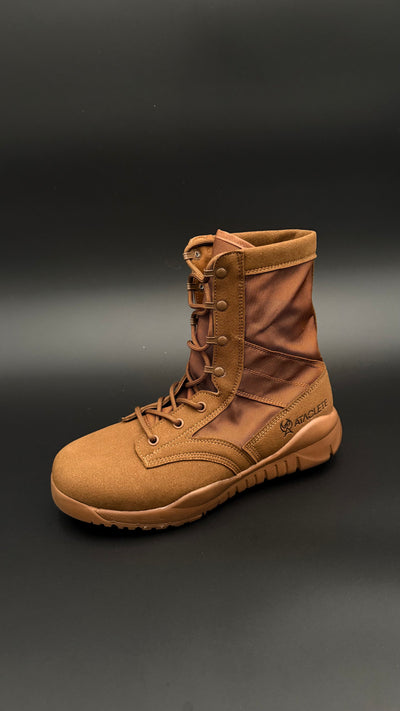 Brown combat boot on a dark gray background