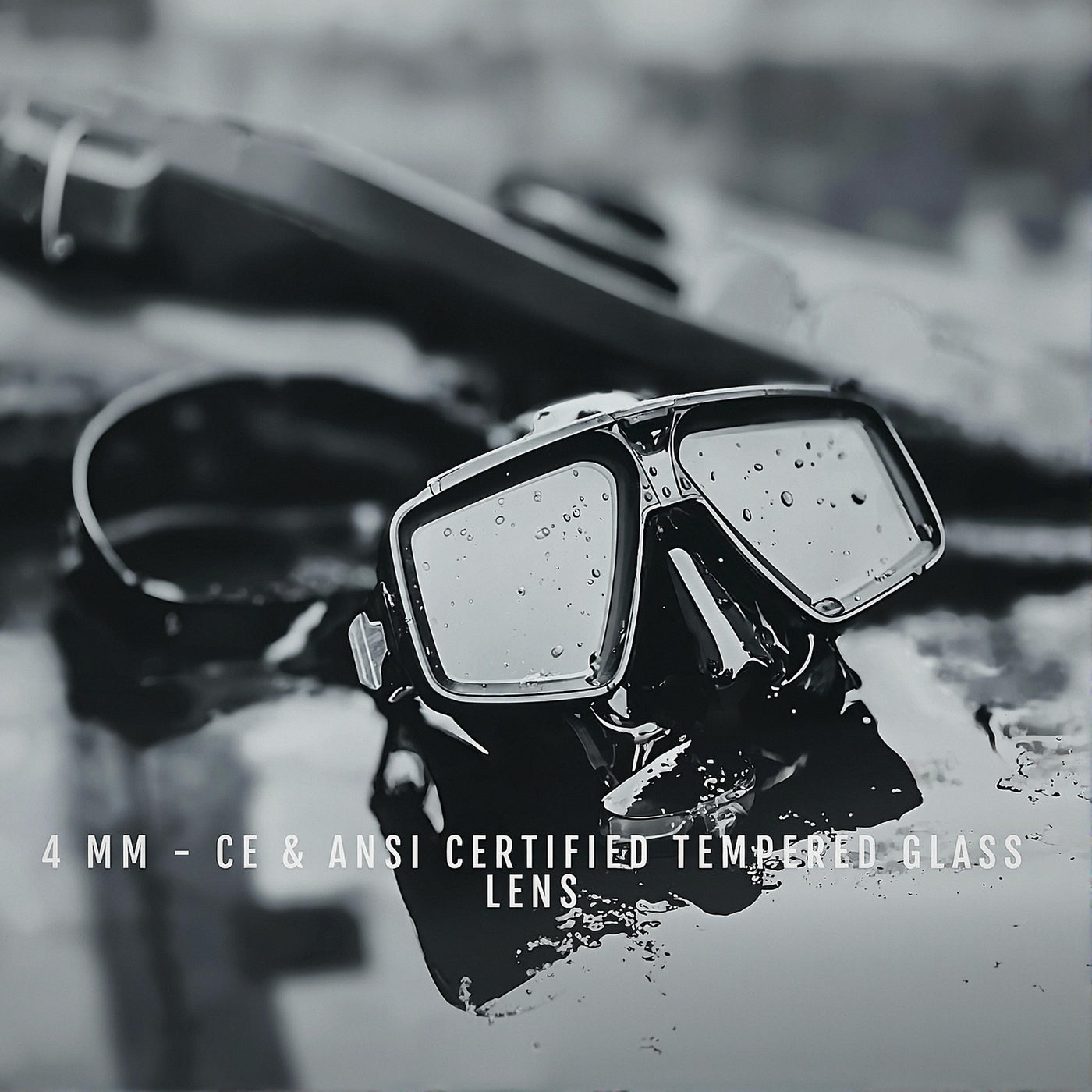 Pair of goggles with tempered glass lenses on a reflective surface